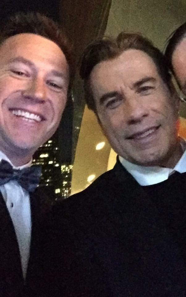 Troy Gray with John Travolta at the Emmy Awards
